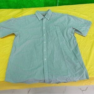 L.L. Bean seersucker, green and white short sleeve summer shirt. It’s a classic.